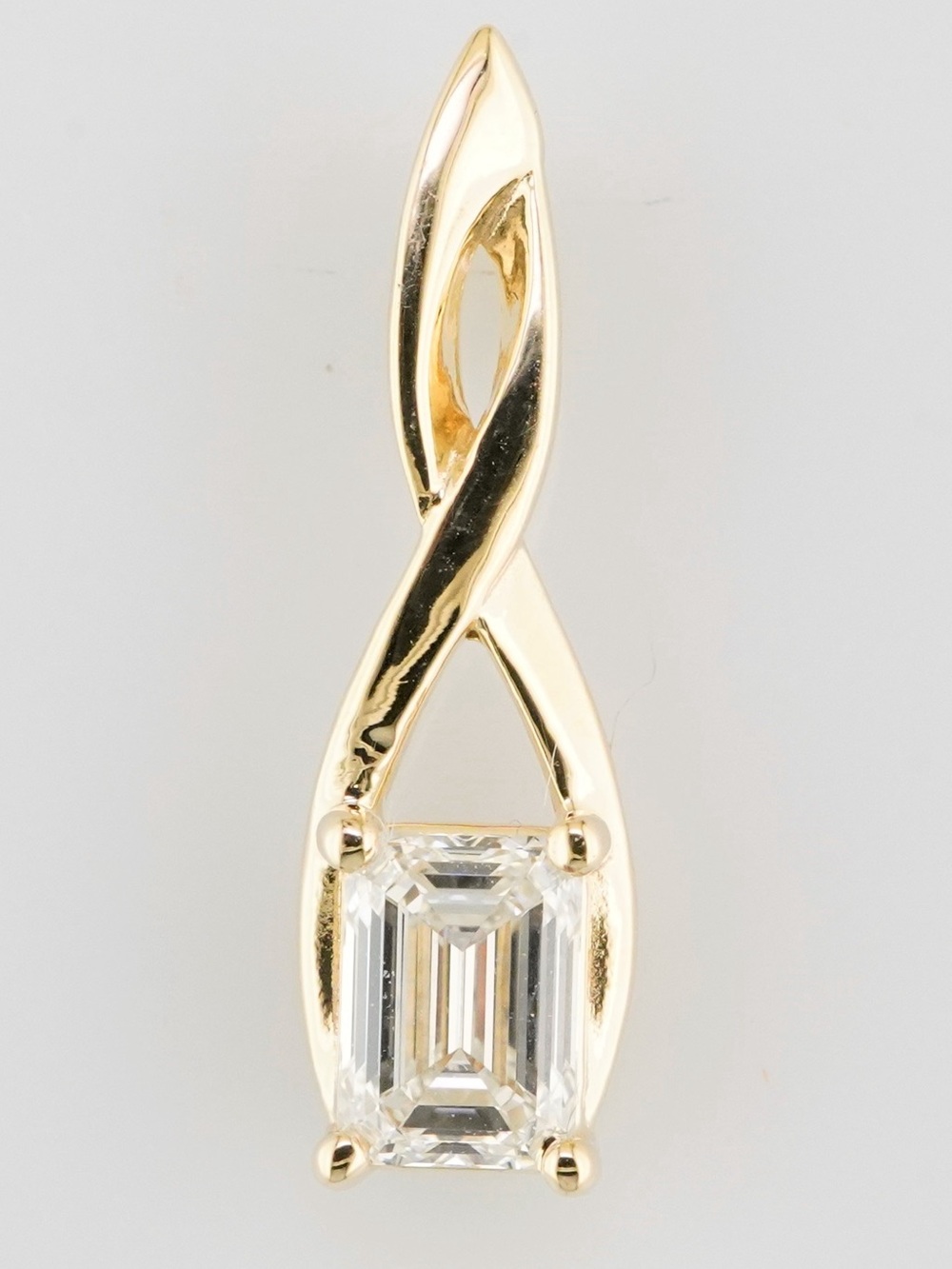 Solid 14k yellow gold GIA certified .91ct emerald cut natural diamond pendant